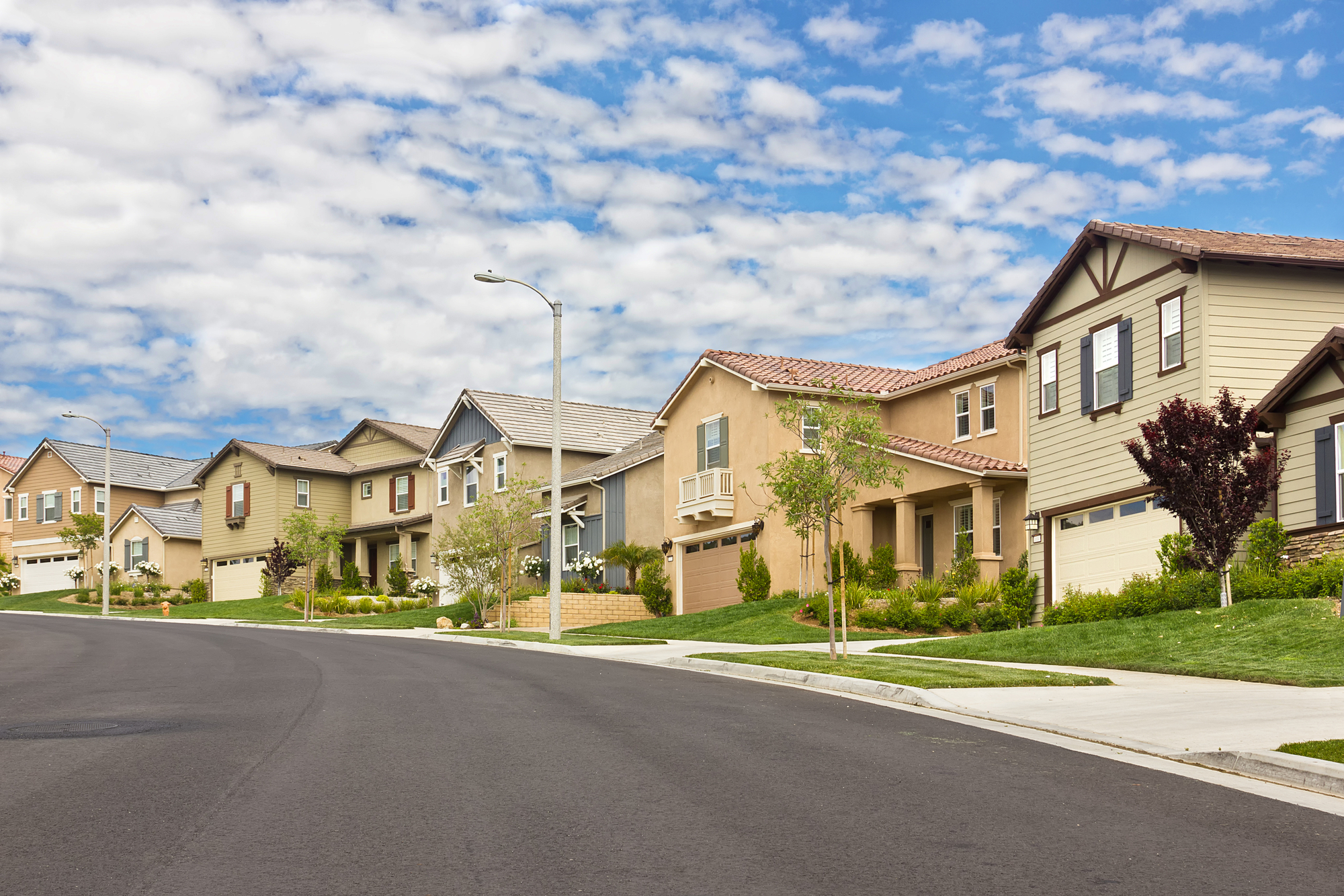 A good quality driveway in front of houses