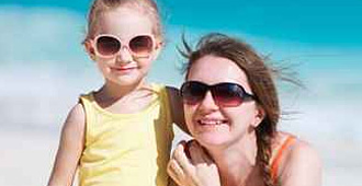 Mother and daughter smiling