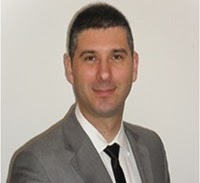Dr. Julian Rrushi
