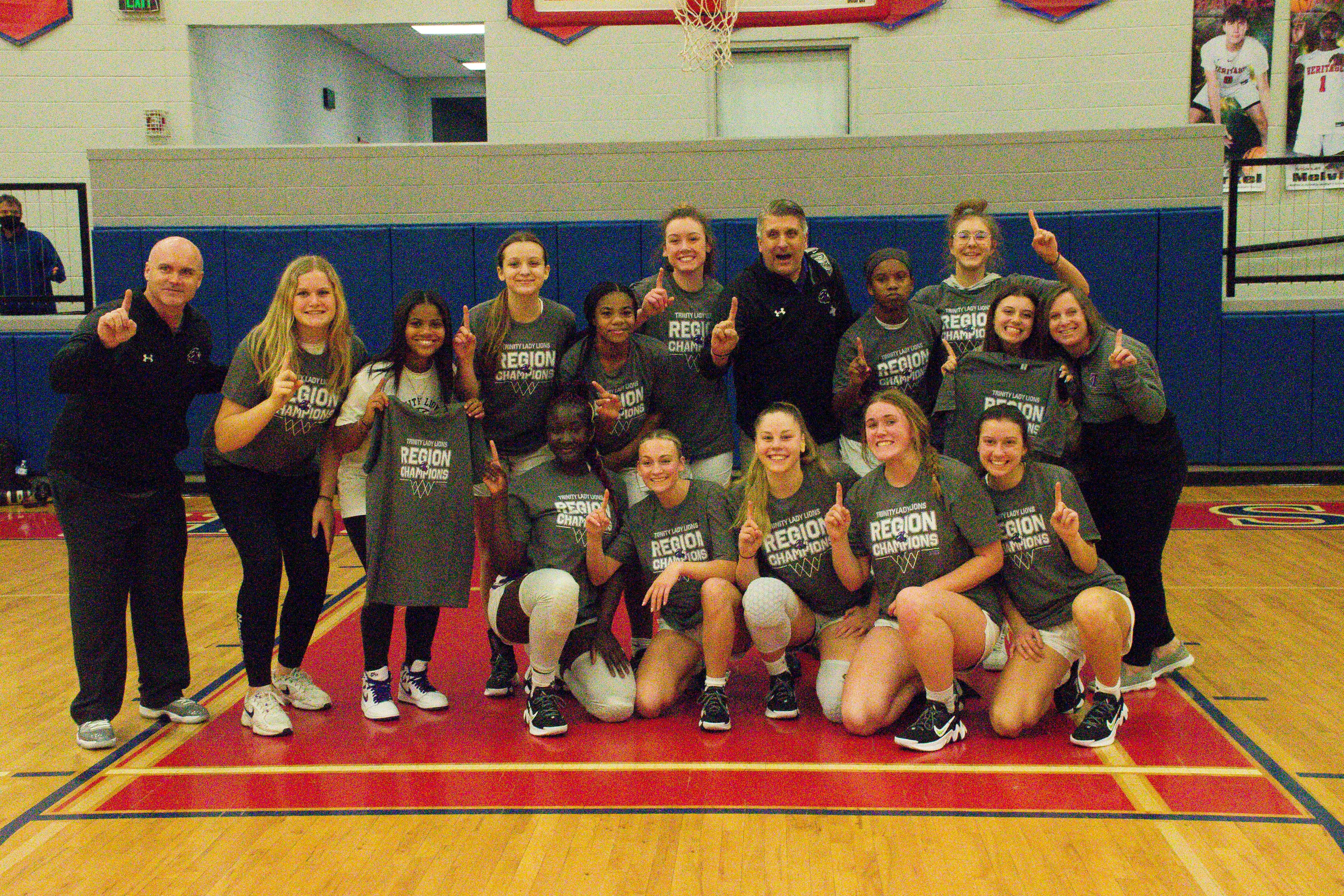 REGION CHAMPS Trinity girls take 14 game winning streak 4 A