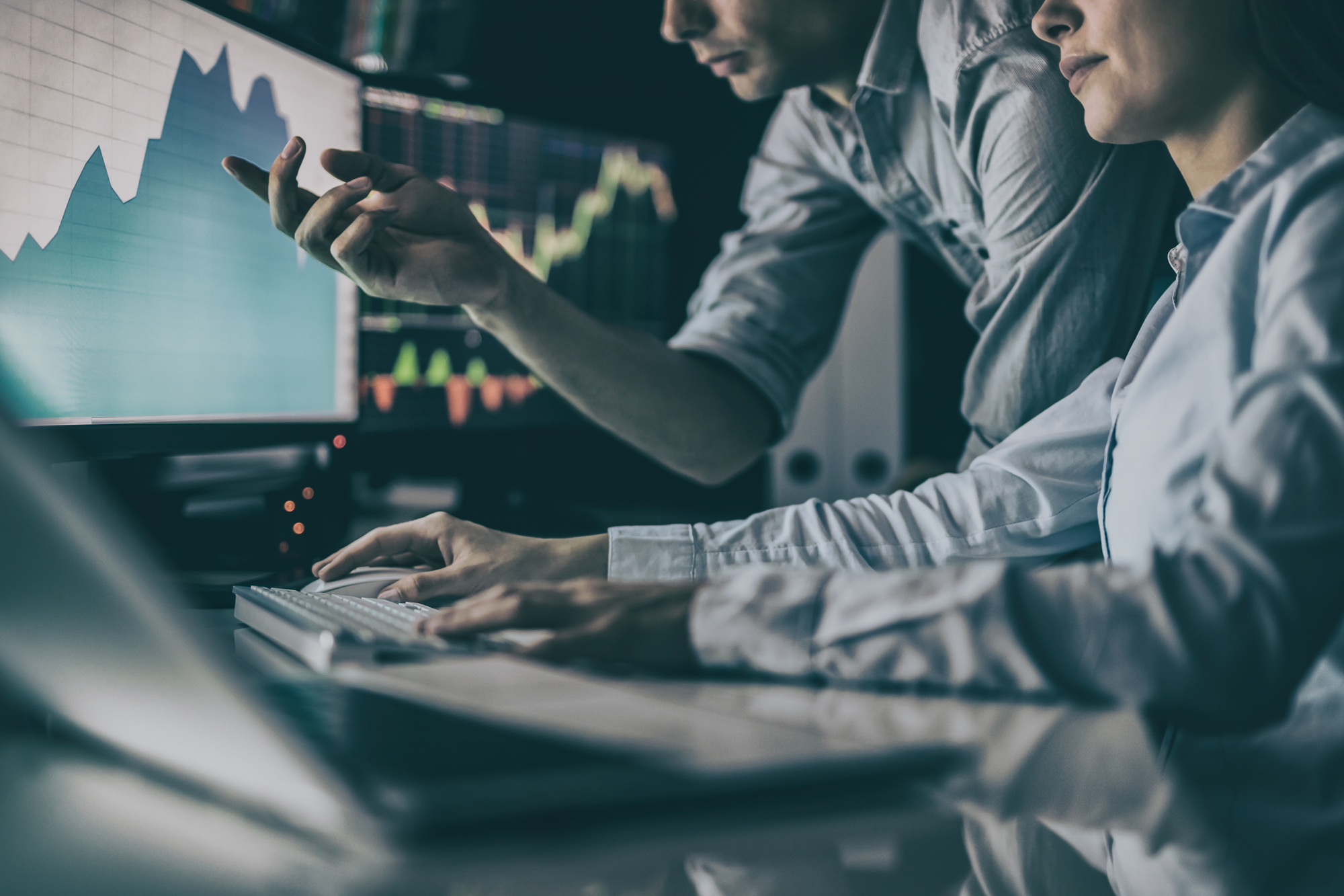 Financial Advisors Studying A Market Graph