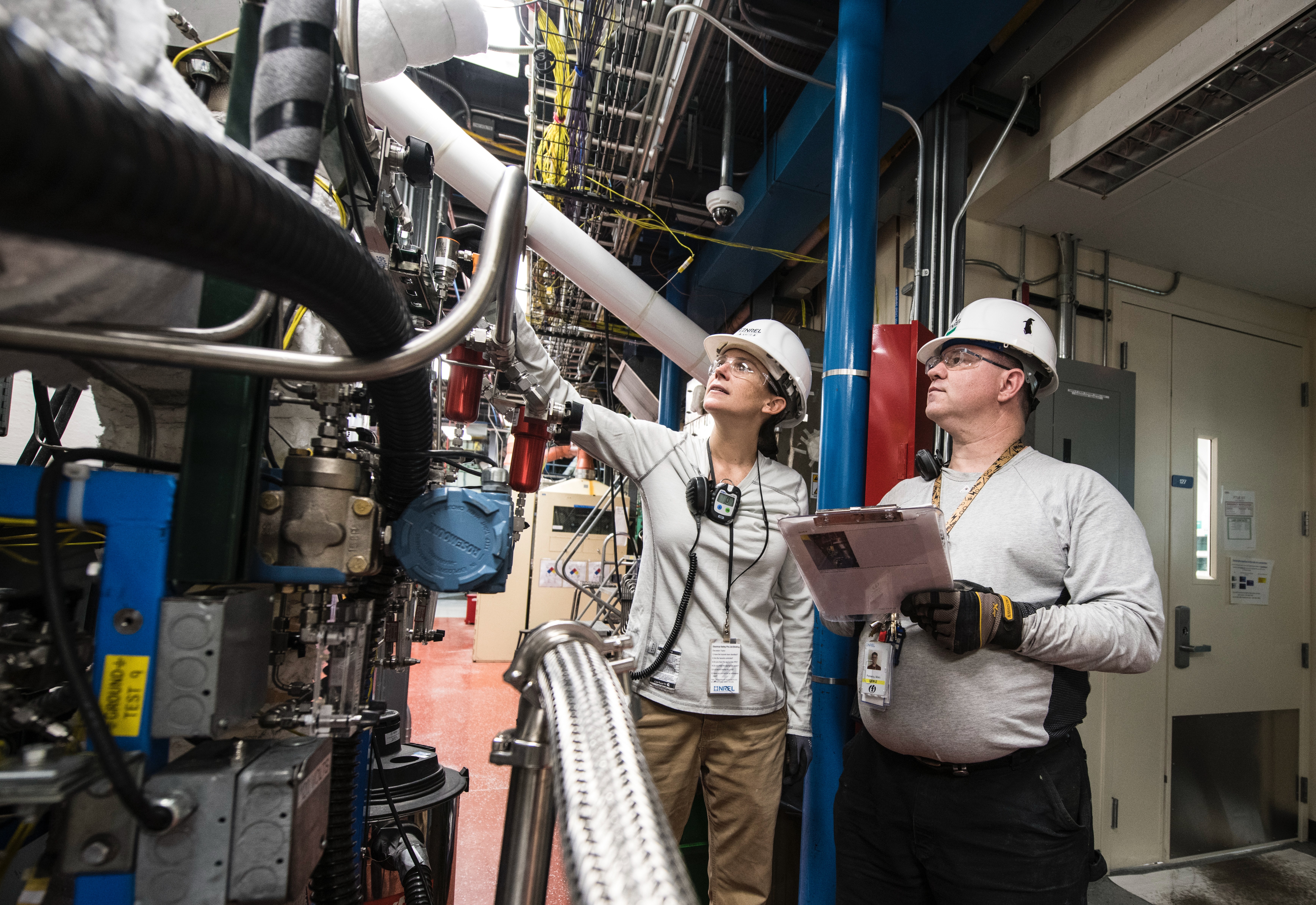 Staff Checking Pipes