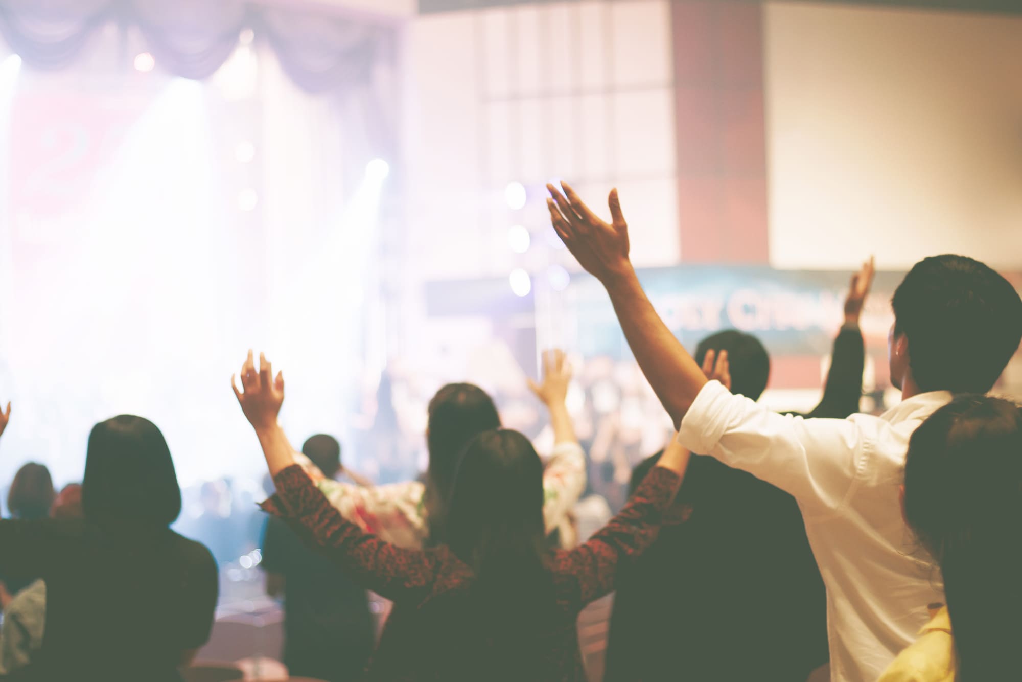 Christian worship with raised hand