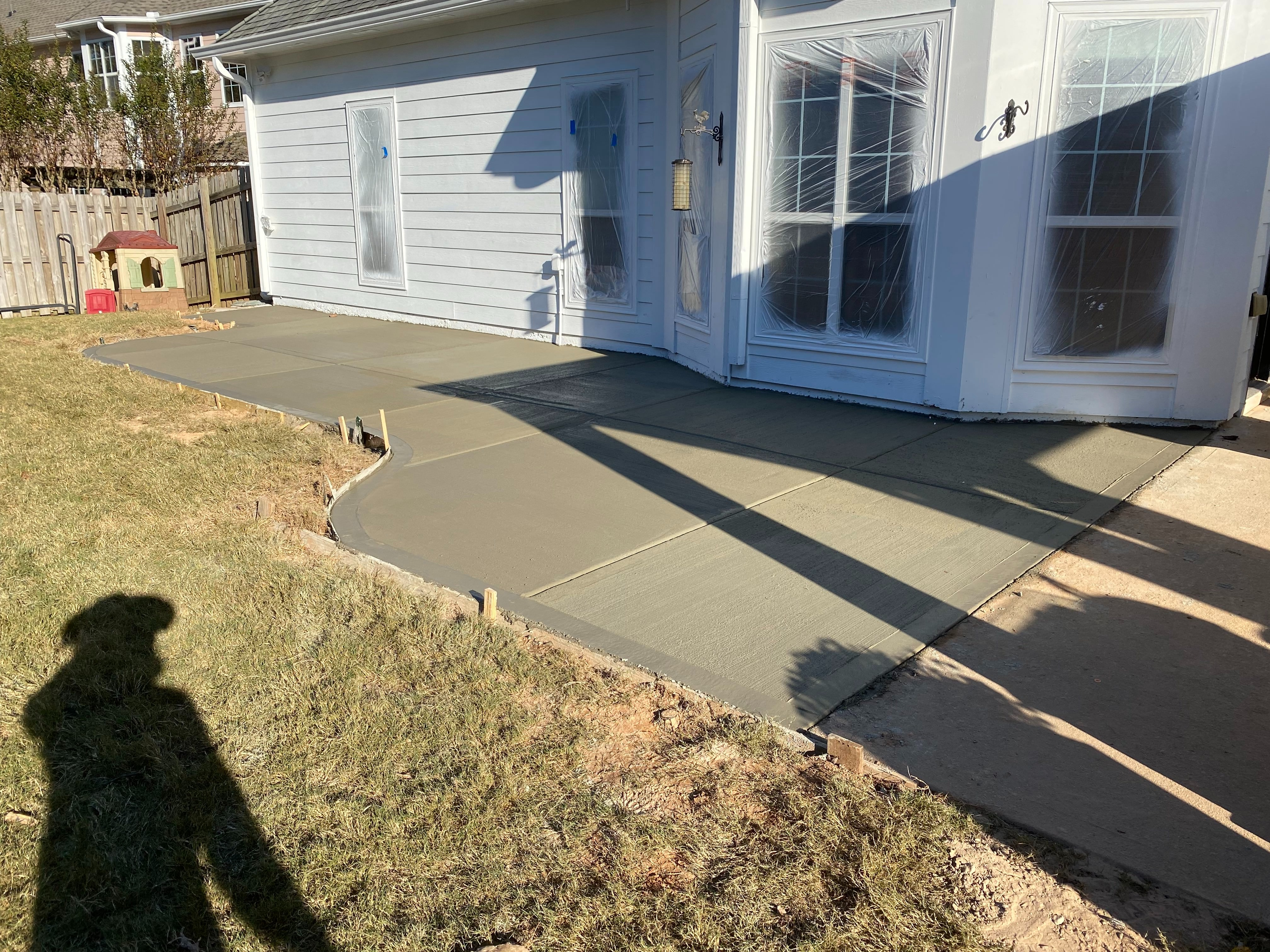 An alternated broom finish applied by GA Peach Concrete offers a distinctive textured pattern that enhances the appearance of the concrete.