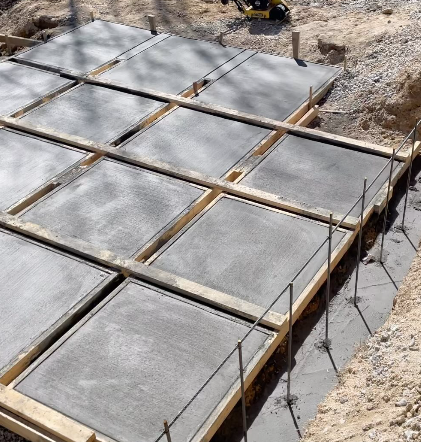 A solid and reliable concrete patio designed and installed by GA Peach Concrete. Square patterns.