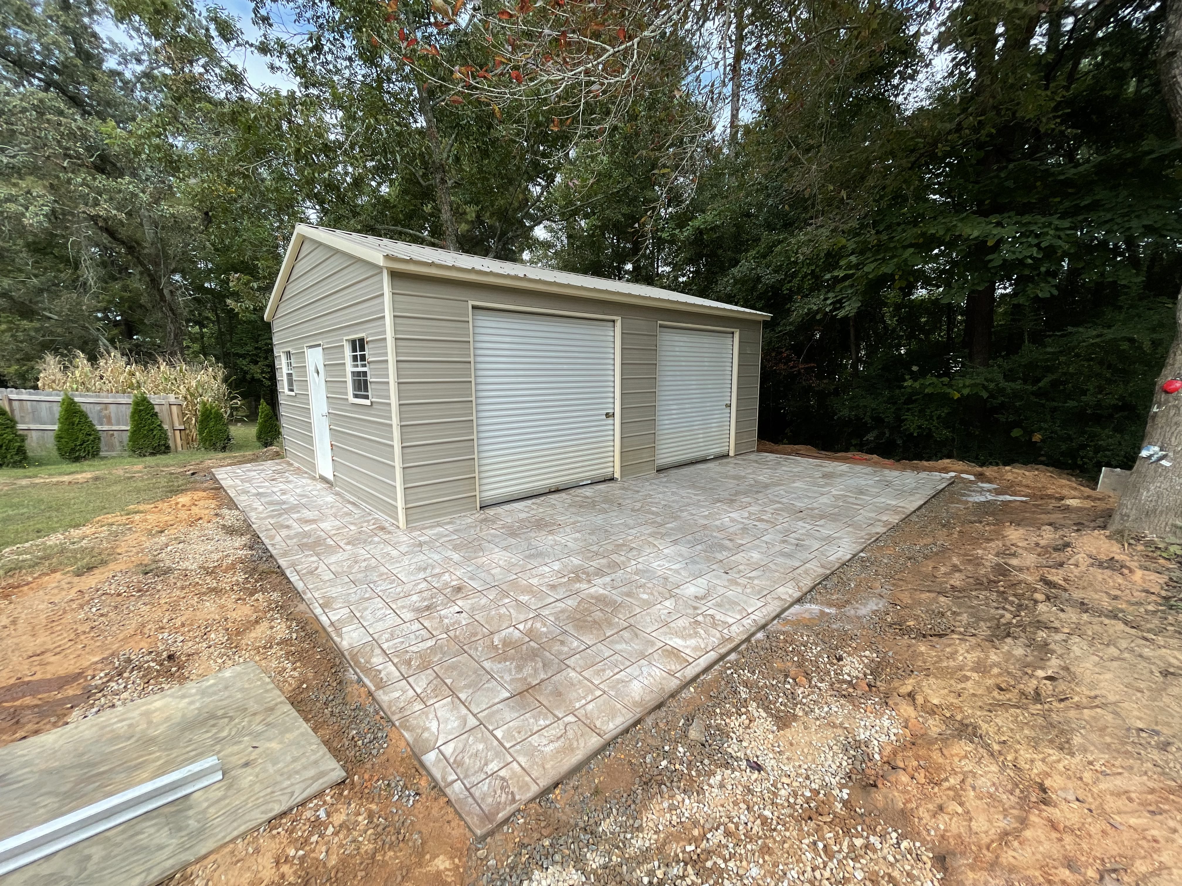 A beautifully designed custom patio by GA Peach Concrete, featuring stamped concrete for a unique outdoor living space. Perfect for entertaining or relaxing.