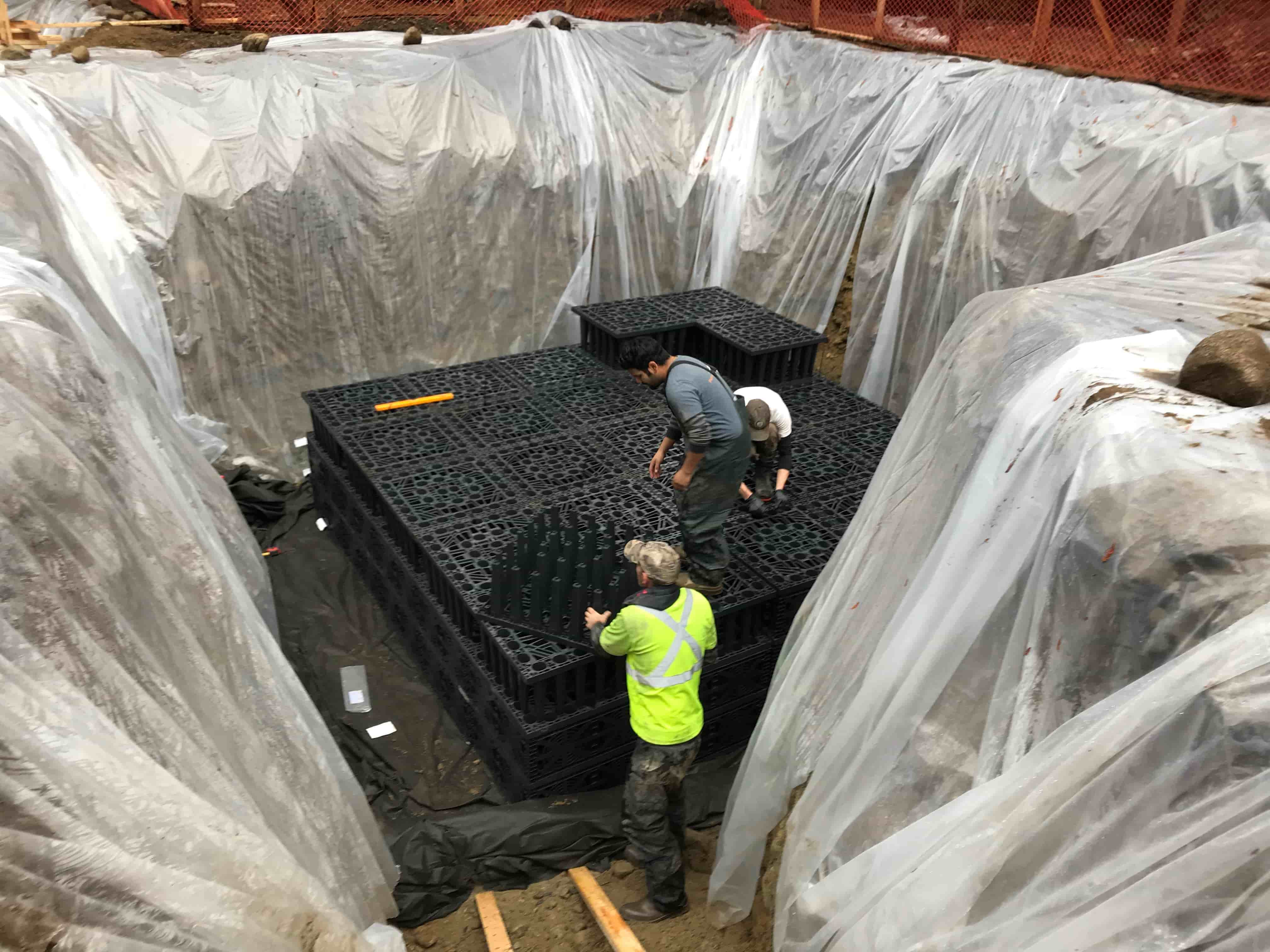 Workers setting up formwork.