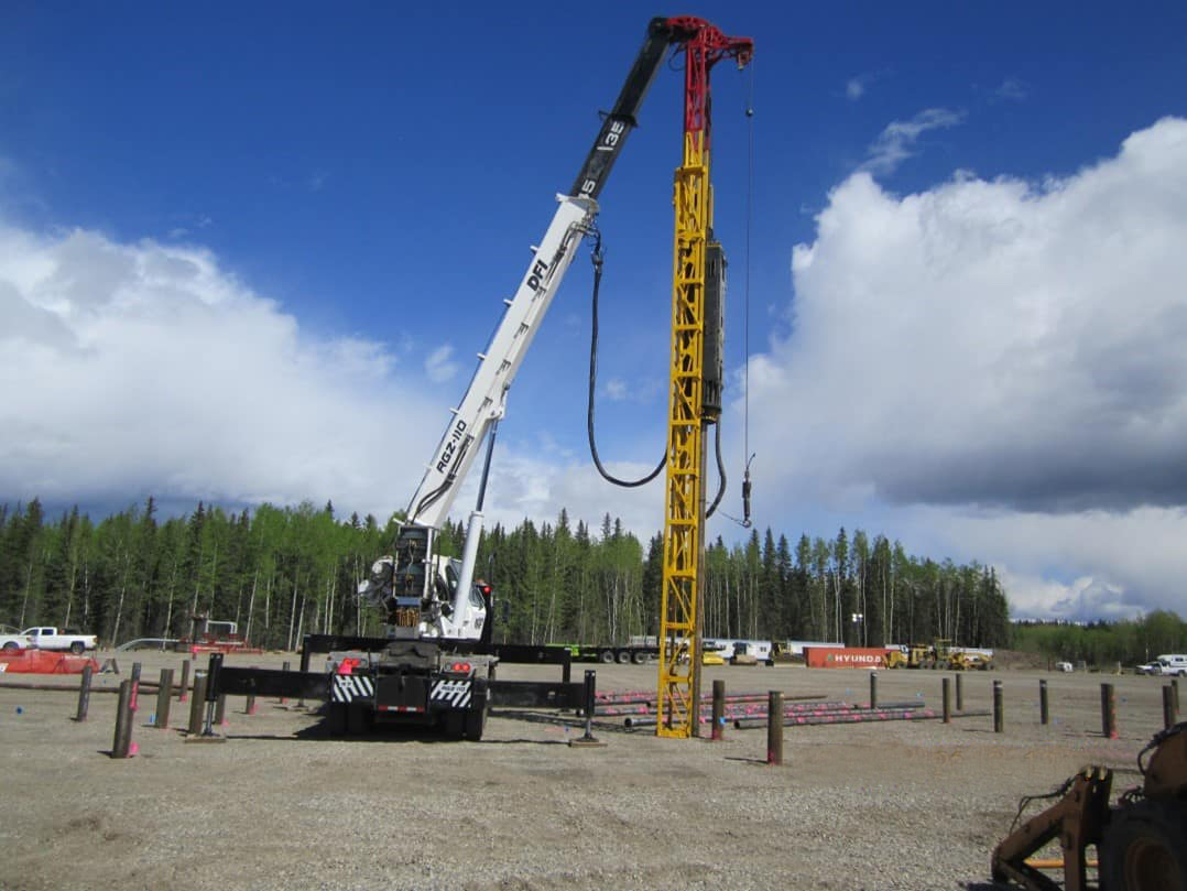 Truck and machine digging the ground