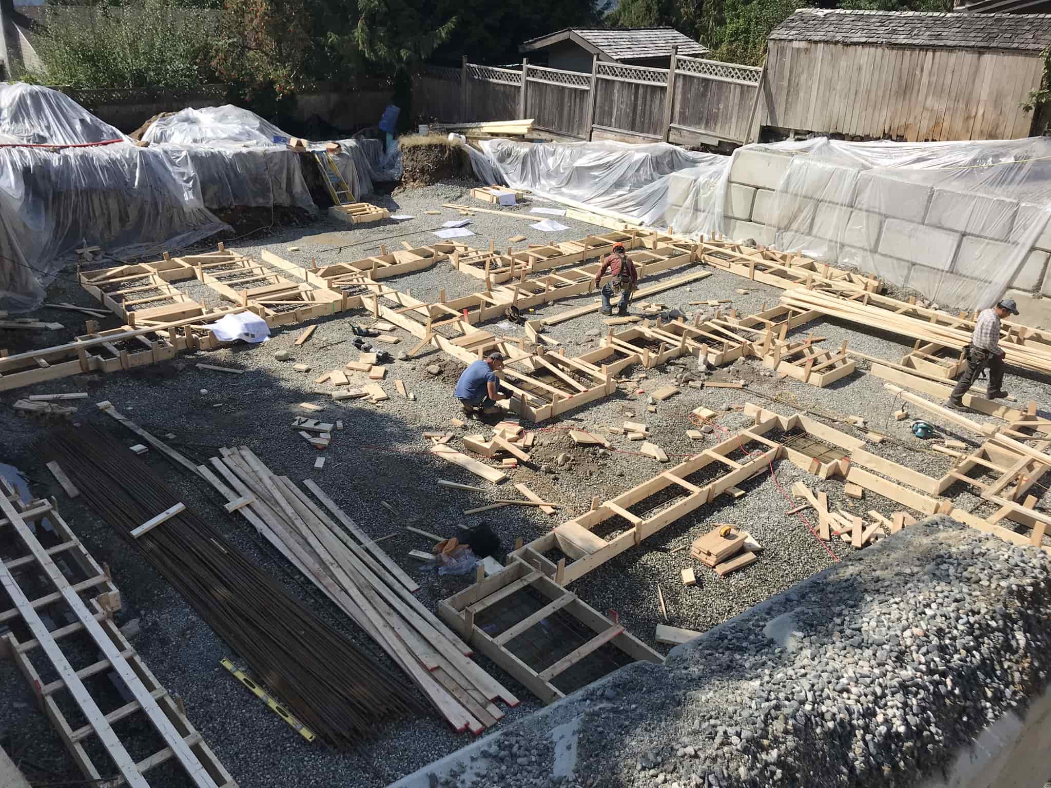 Engineers making foundation for building