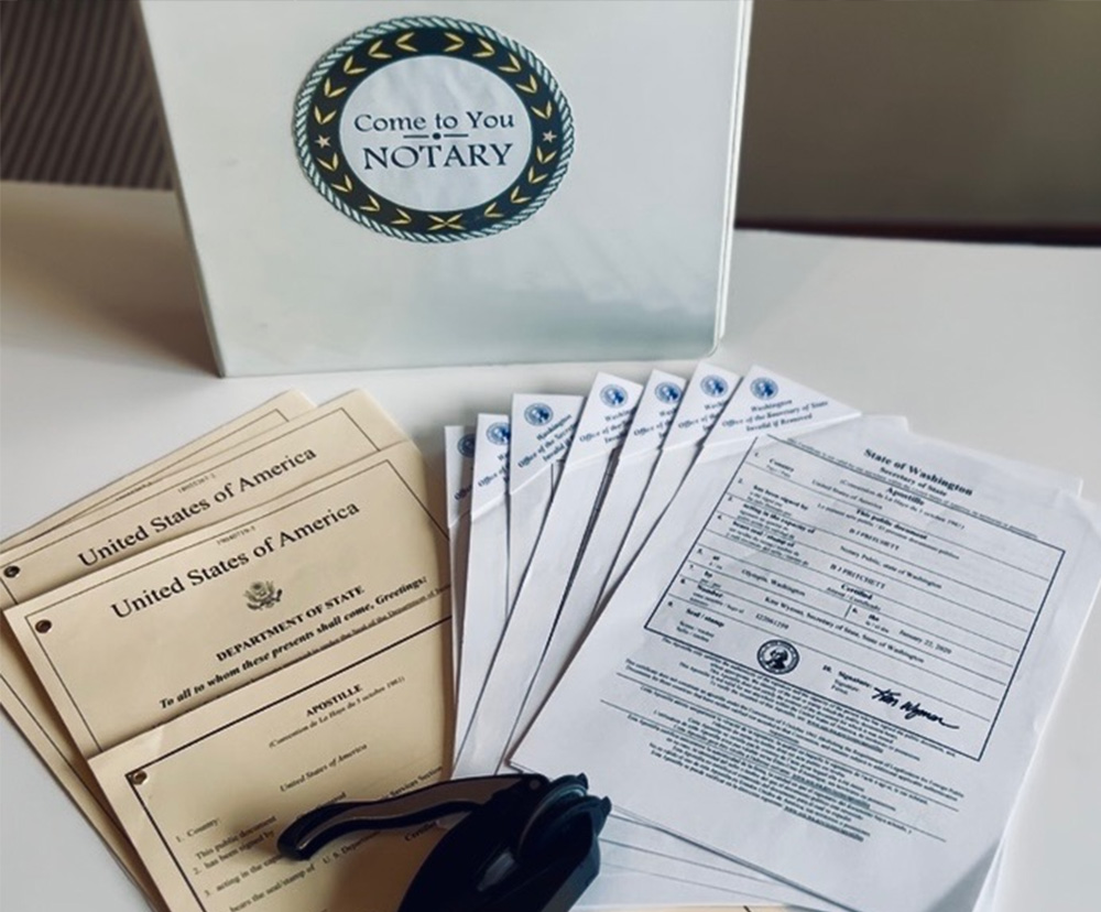 A notary public kit featuring official documents and a notary stamp