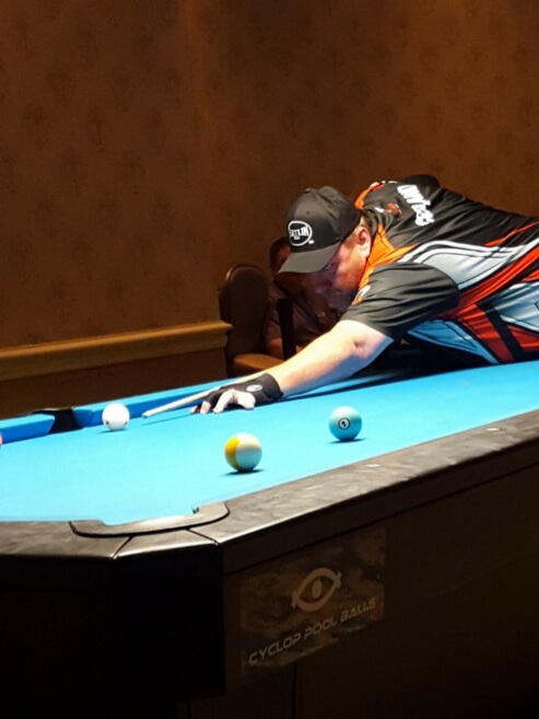 Man Playing Billiard