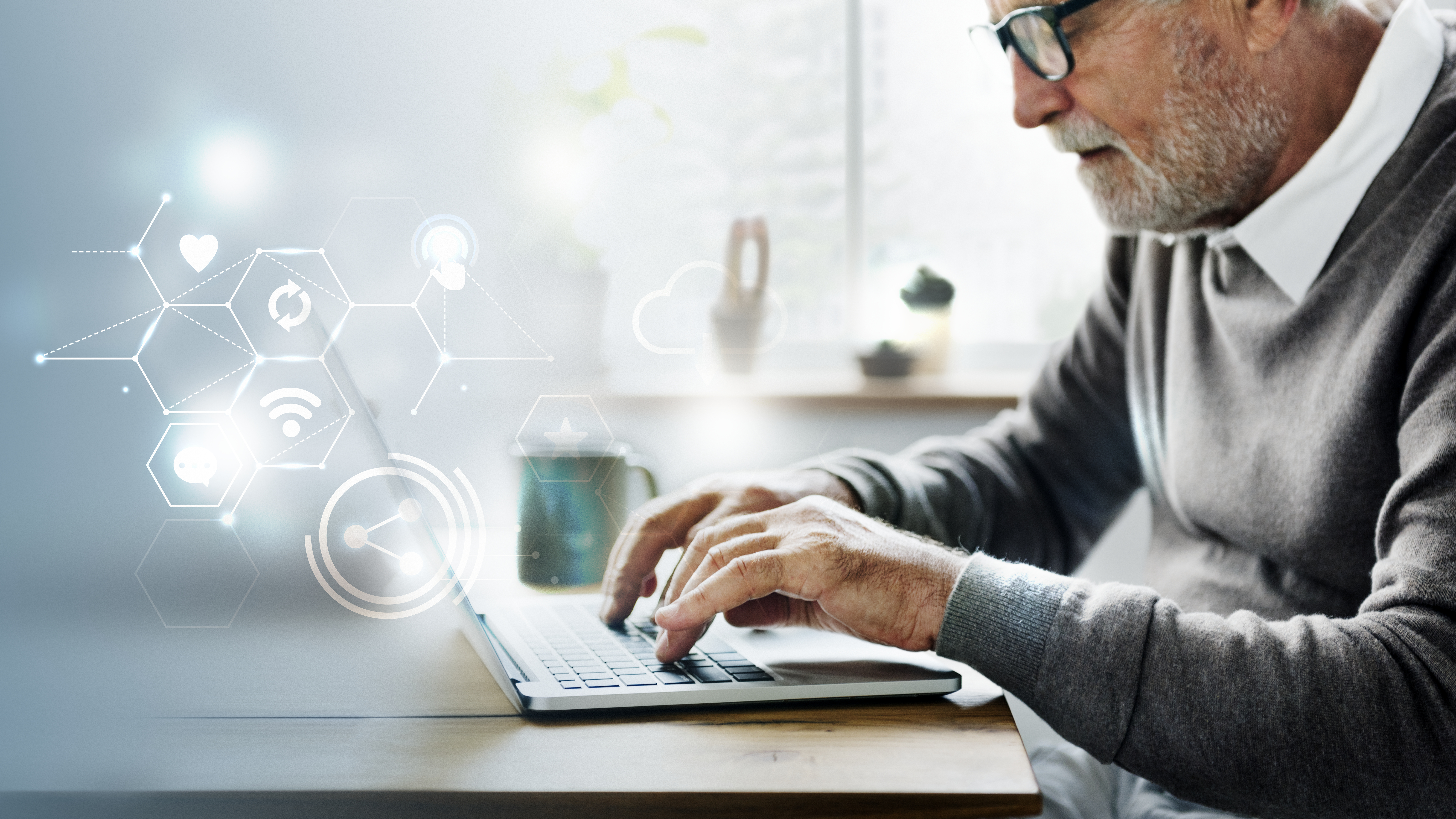 photo illustrating a man for Boomers generation on his keyboard