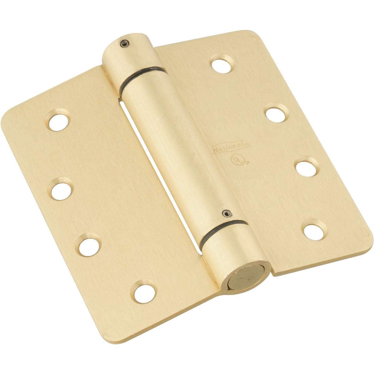 National Hardware 4 In. 1/4 In. Radius Brass Spring Door Hinge
