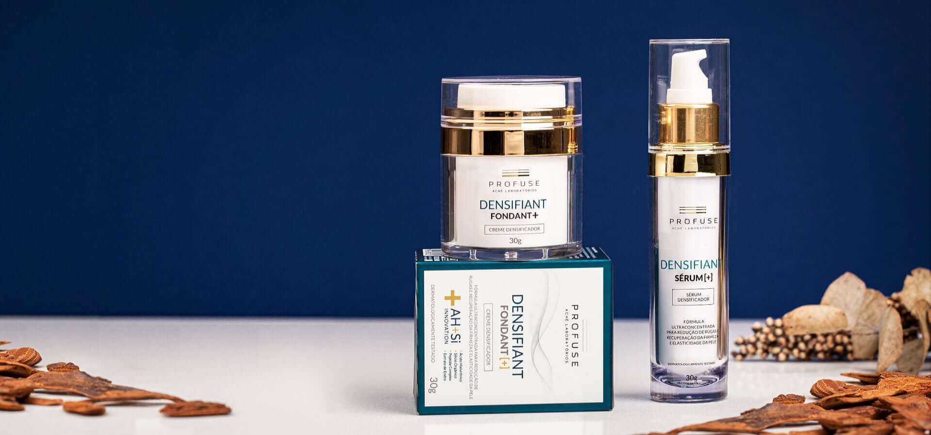 Imagem mostra dois produtos: Densifiant Fondant+ e Densifiant Sérum+ em um fundo azul