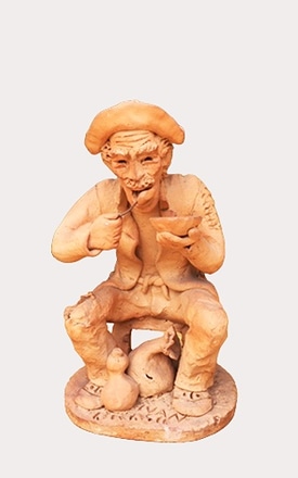 Escultura de Barro Homem se Alimentando main photo of Escultura de Barro Homem se Alimentando