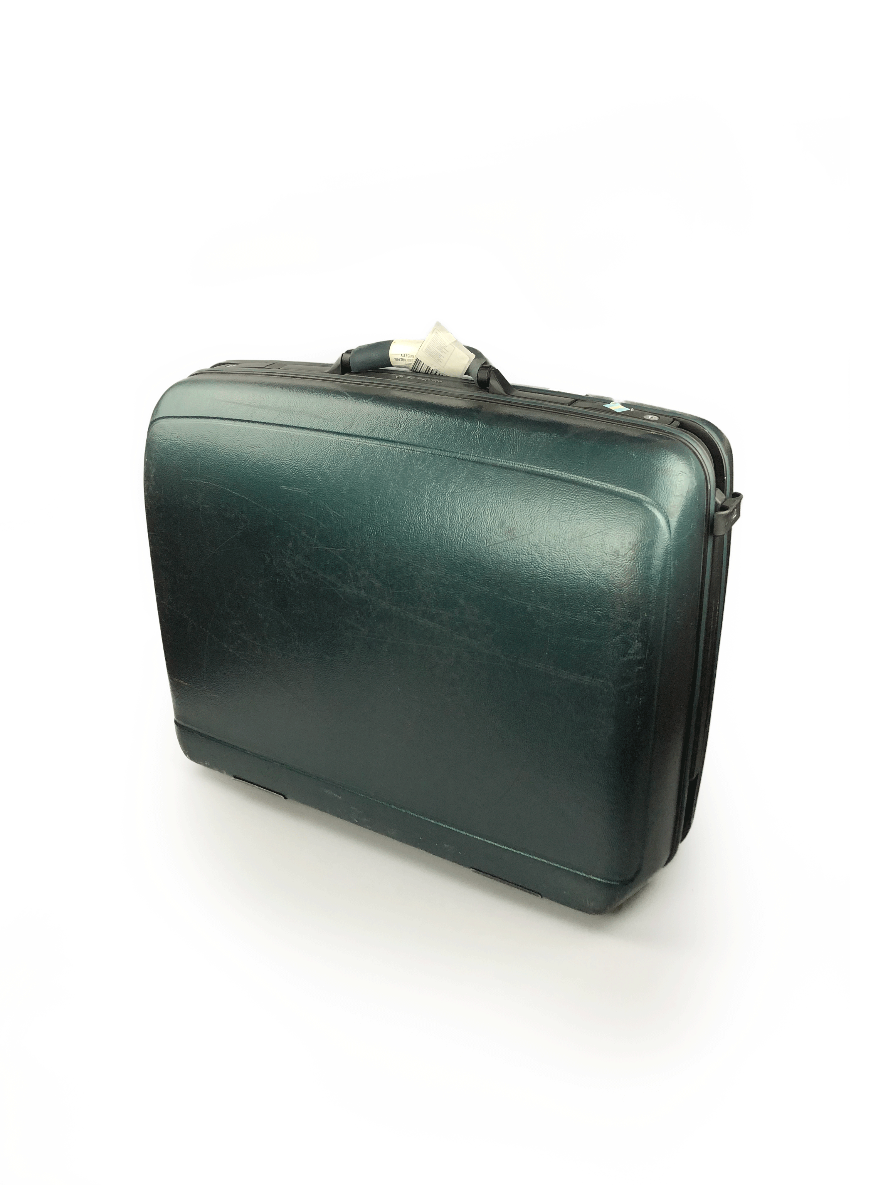 green hard shell luggage