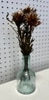 glass vase with dried flowers
