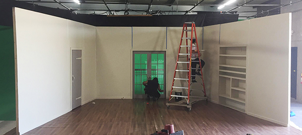 A set wall getting some light patching, sanding and painting