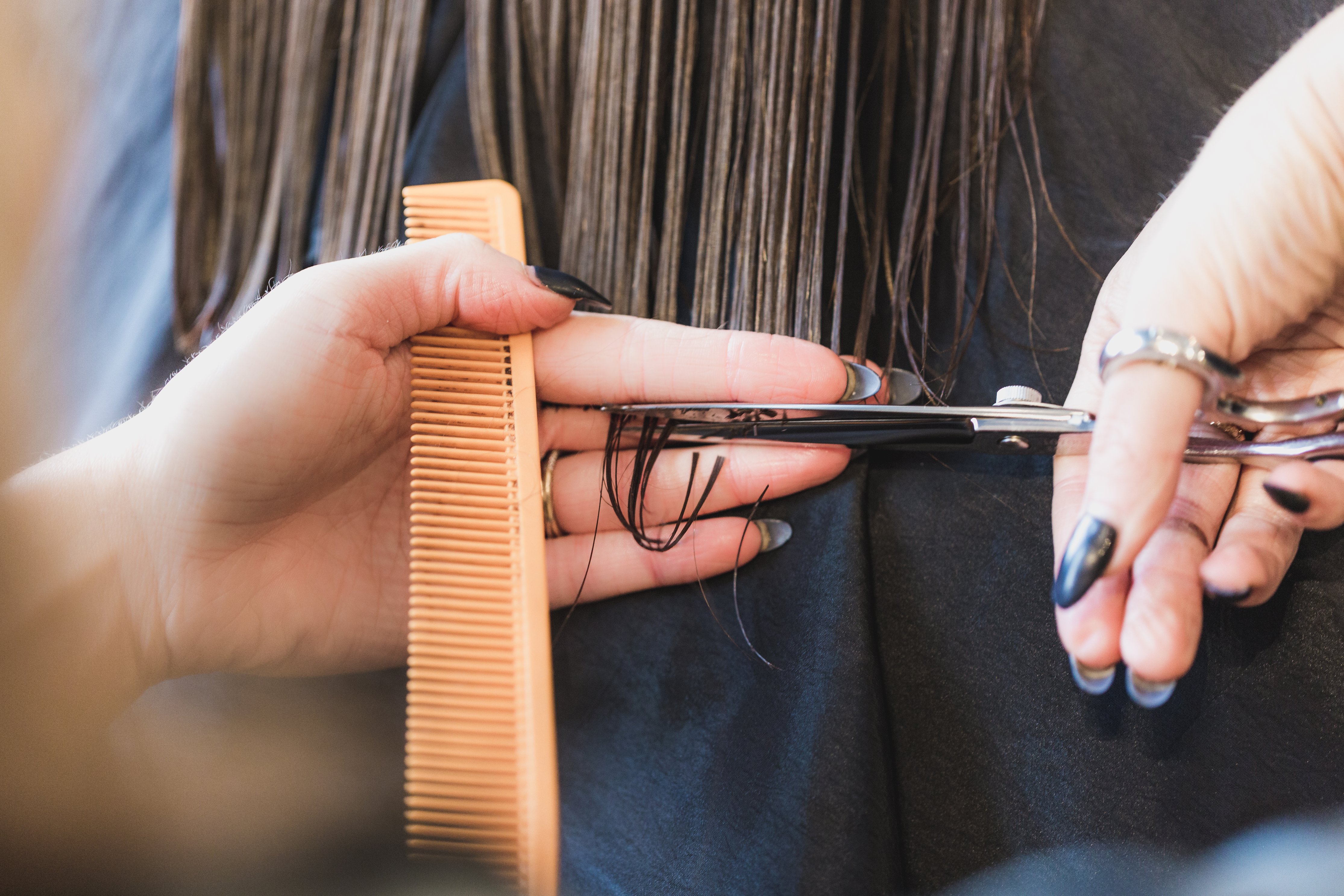 cutting hair with scissors