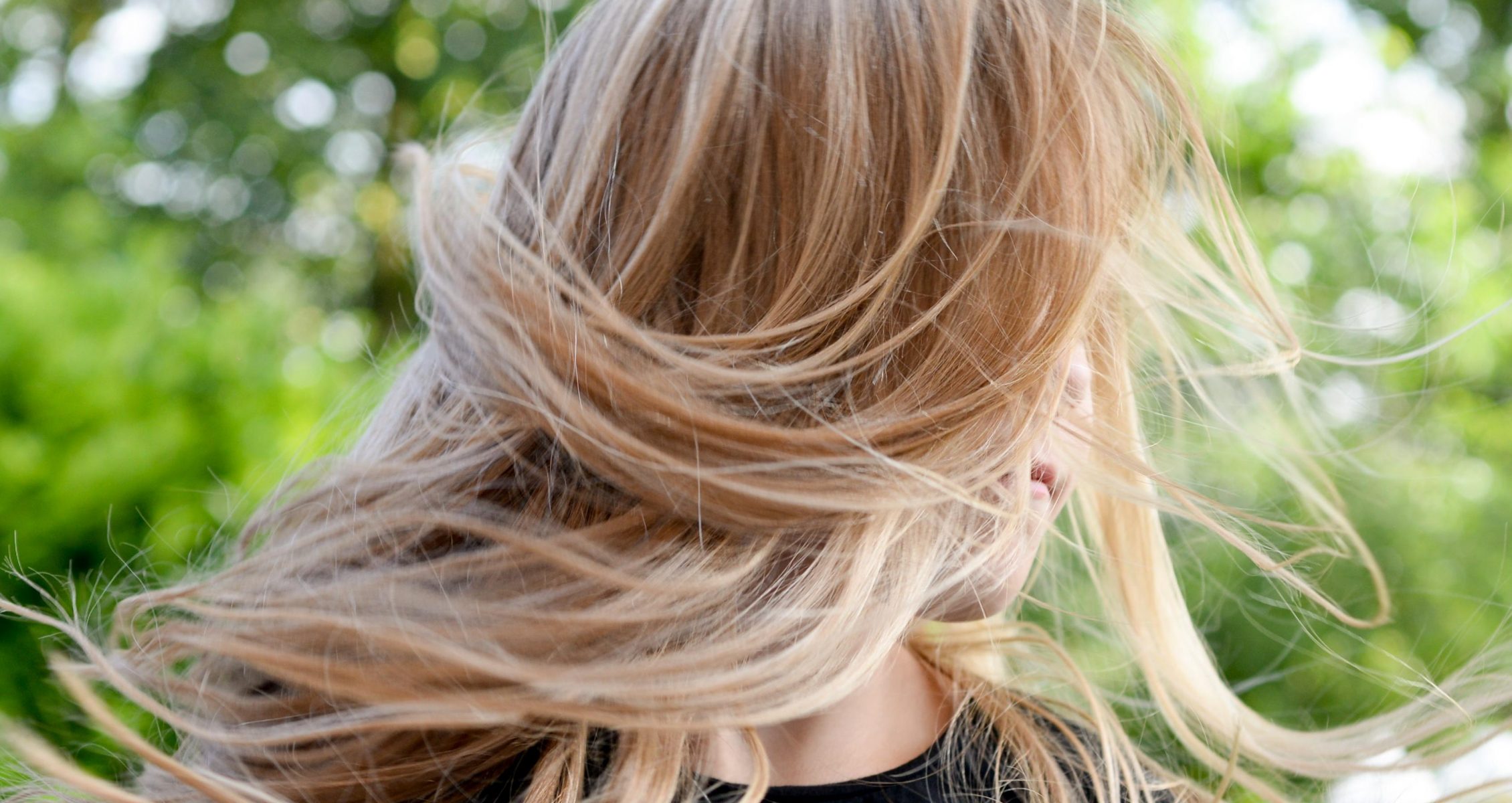 4 Pro Tips For Going From Dark To Blonde Hair Without Damage