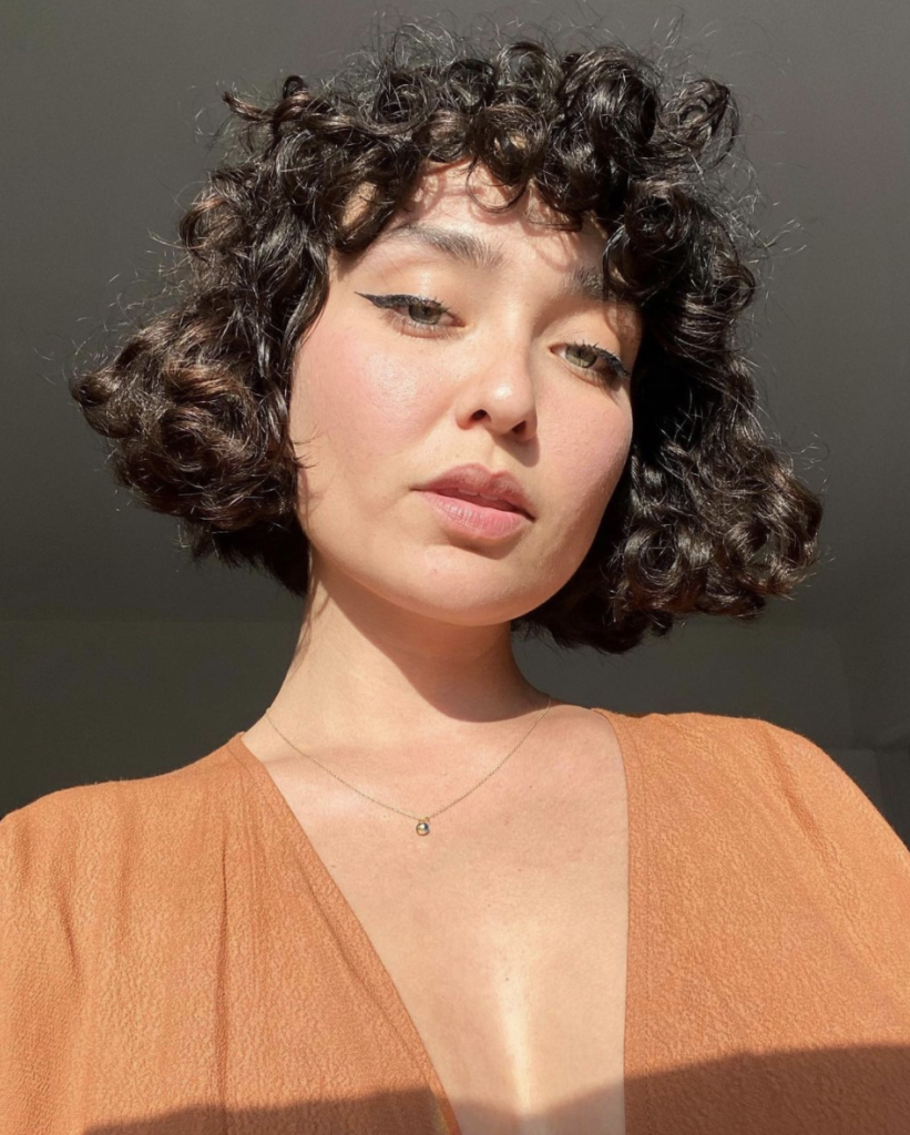woman with curly bob