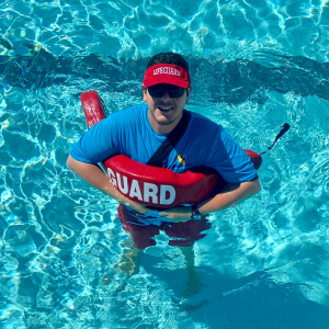 Santa Ana lifeguard floating in pool