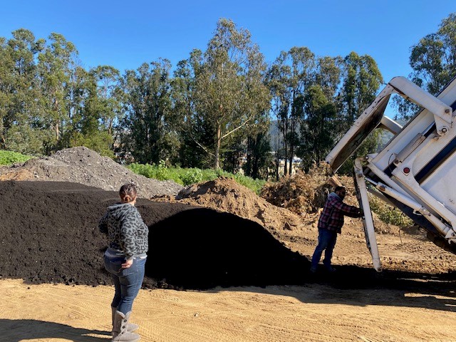 Compost being delivered to Woodlawn Cemetery