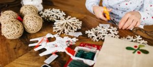 Child making a Christmas Craft