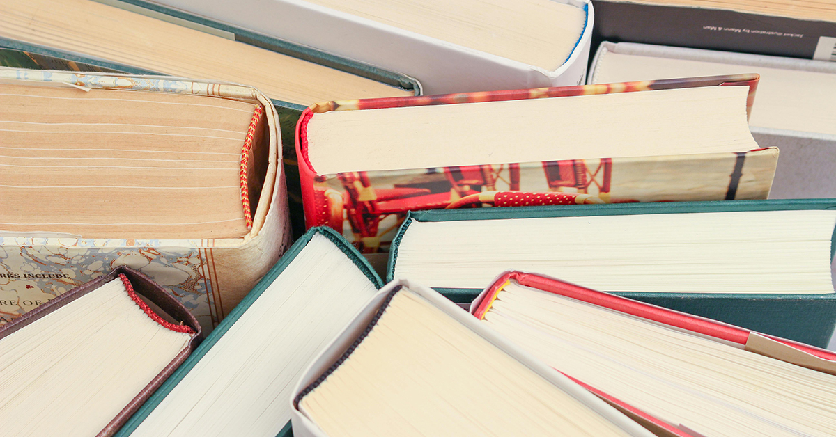 A group of books viewed from above.