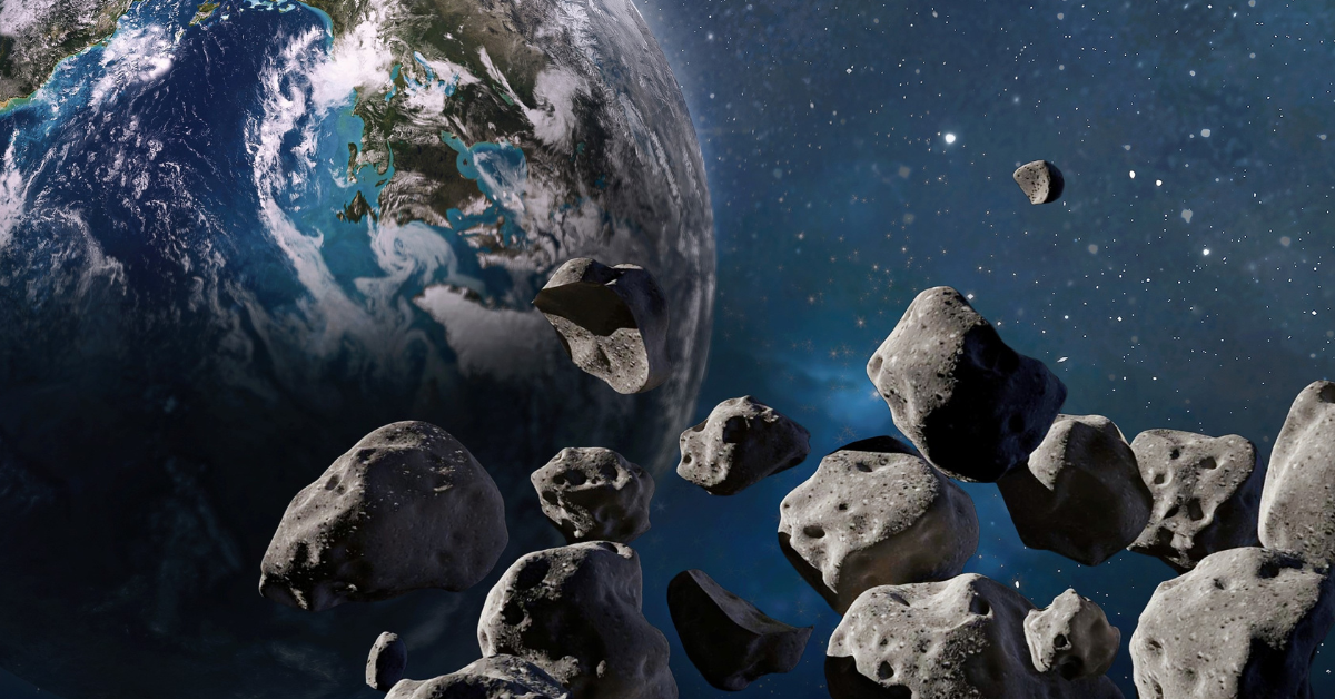 Artwork showing Earth from space with several asteroids nearby.