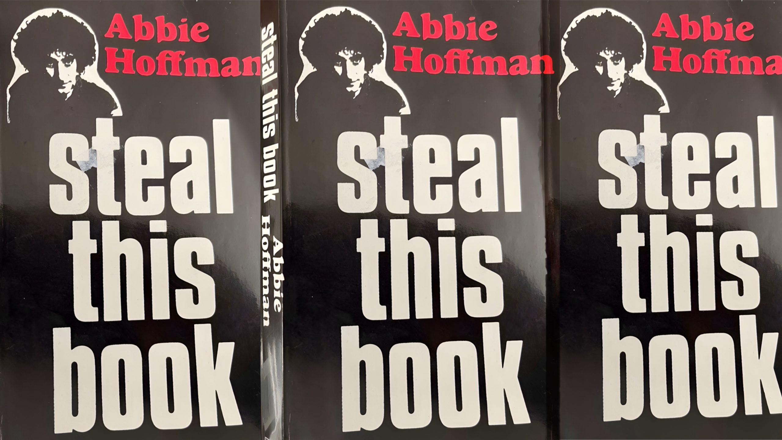 Three side-by-side copies of the book Steal This Book by Abbie Hoffman.