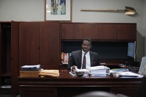 Robert Blaine at desk