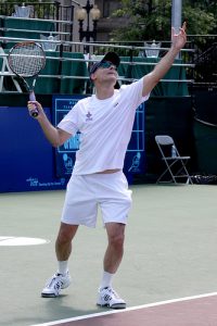 Alan Krueger playing tennis