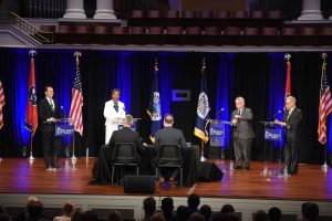 Four candidates during Mayoral Debate