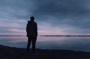 man and lake