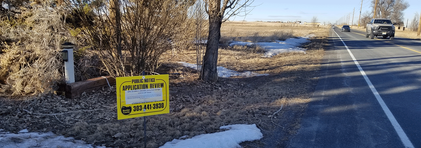 Public Notice on Side of Road to Intro Article