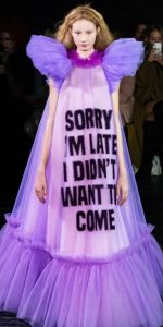 Dress from a runway show that says "Sorry I'm Late, I didn't want to come"