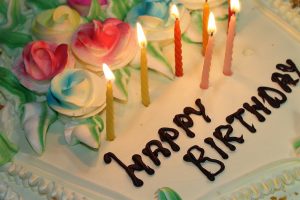 close up of birthday cake with candles