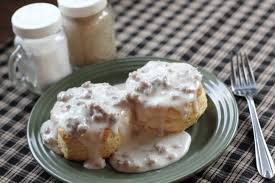 Biscuits and gravy on a table