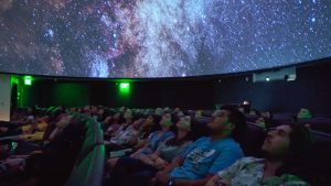 Audience in a planetarium