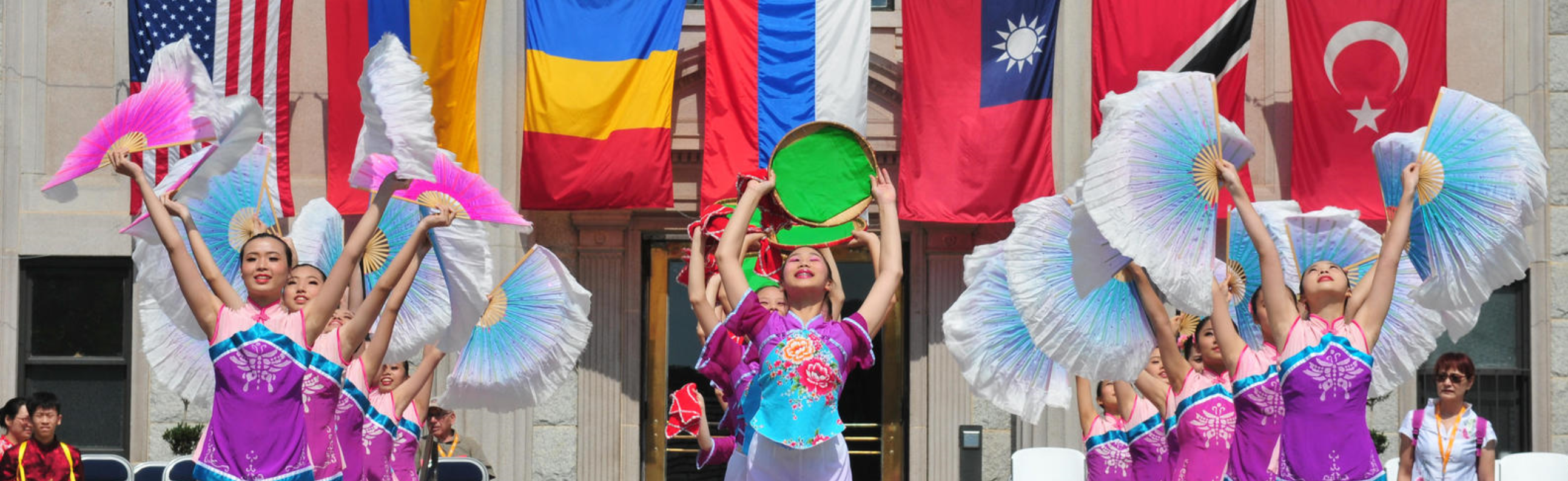 Folkmoot dancers and flags