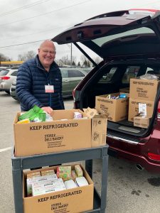 Larry volunteers to deliver rescued food