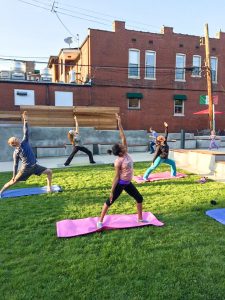 people doing yoga outdoors