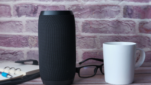 Alexa next to a cup of coffee
