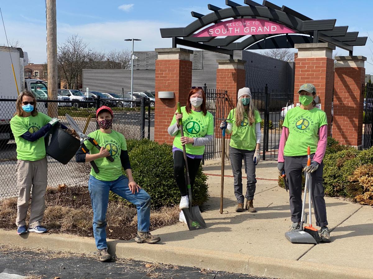 Eco volunteers in green shirts