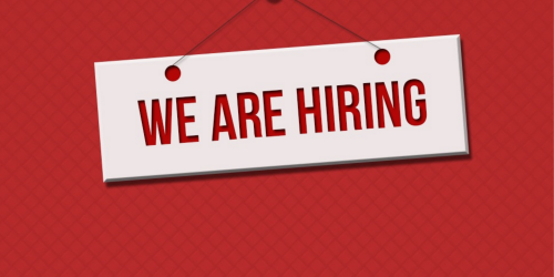 we are hiring text over red background