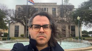 Patrick in front of Waco, TX City Hall