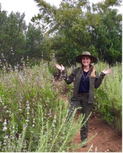 Part-time park and trail ranger for the City of San Marcos, CA standing on a nature trail.