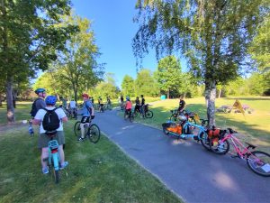 People on bicycles in a park