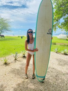 The author with her surfboard